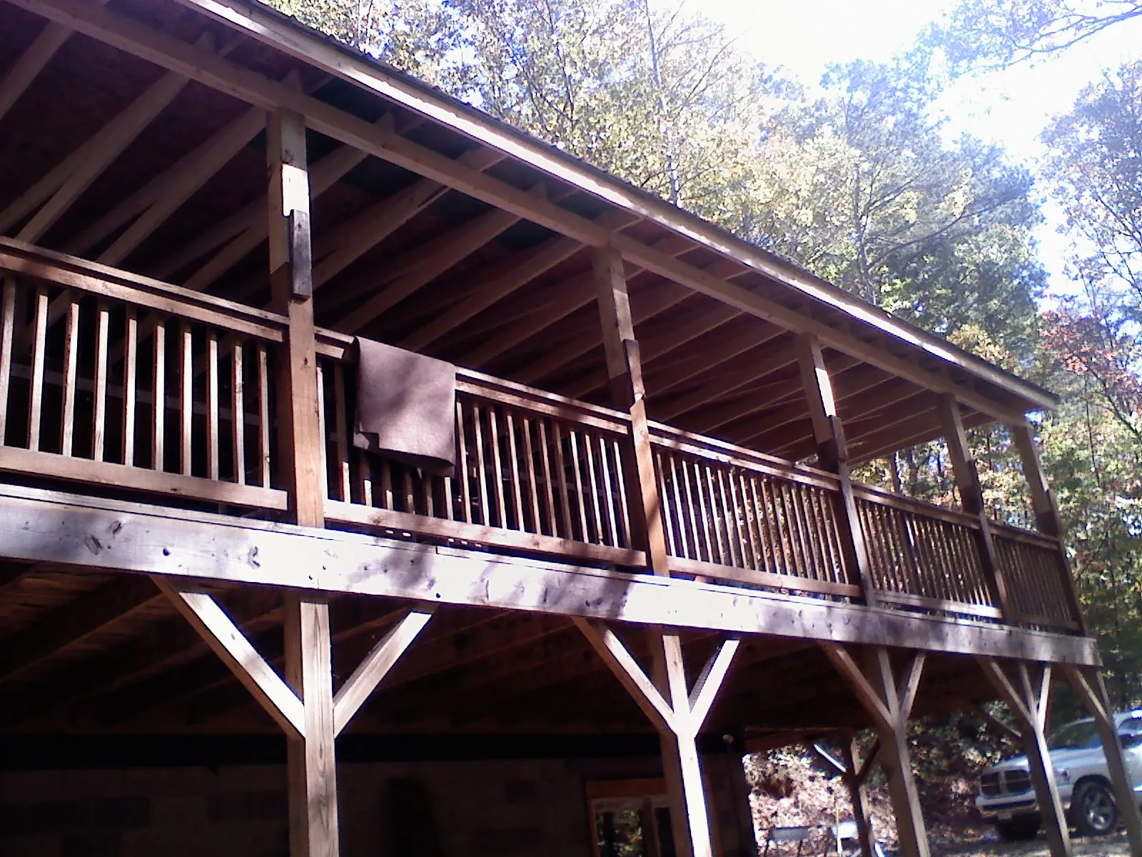Timber framing under a new elevated porch and deck — Roof Leak Repair in Etta by Roofing Brothers